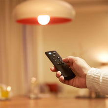 Load image into Gallery viewer, The Wiimote lets you have quick and easy control of your WiZ lights. Set the lights to turn on/off, adjust brightness, change to the night light, and choose from four favorite light modes just by pressing a button. Works with all WiZ Connected products an