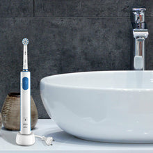 Load image into Gallery viewer, Oral B Pro 570 Sensi Ultra Thin Electric Toothbrush with Refill Head