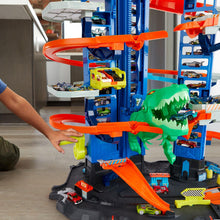 Load image into Gallery viewer, Hot Wheels City Robo T-Rex Ultimate Garage with 2 Cars