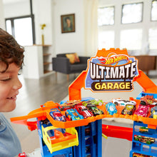 Load image into Gallery viewer, Hot Wheels City Robo T-Rex Ultimate Garage with 2 Cars