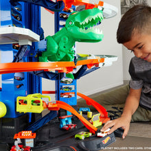 Load image into Gallery viewer, Hot Wheels City Robo T-Rex Ultimate Garage with 2 Cars